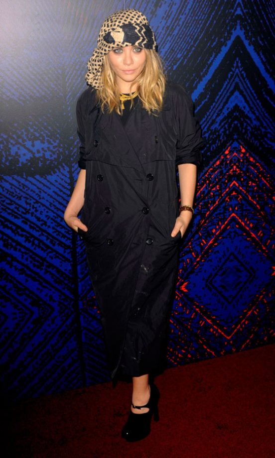 Ashley Olsen Opted For An Unusual Head Scarf And Trench Coat Dress At A YSL Fragrance Launch, June 2010