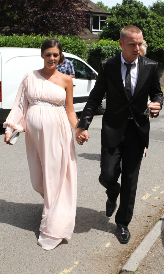 Danielle Lloyd Covers Up Her Baby Bump In A Pretty Asymmetric Dress At Katie Prices' Wedding To Alex Reid, May 2009