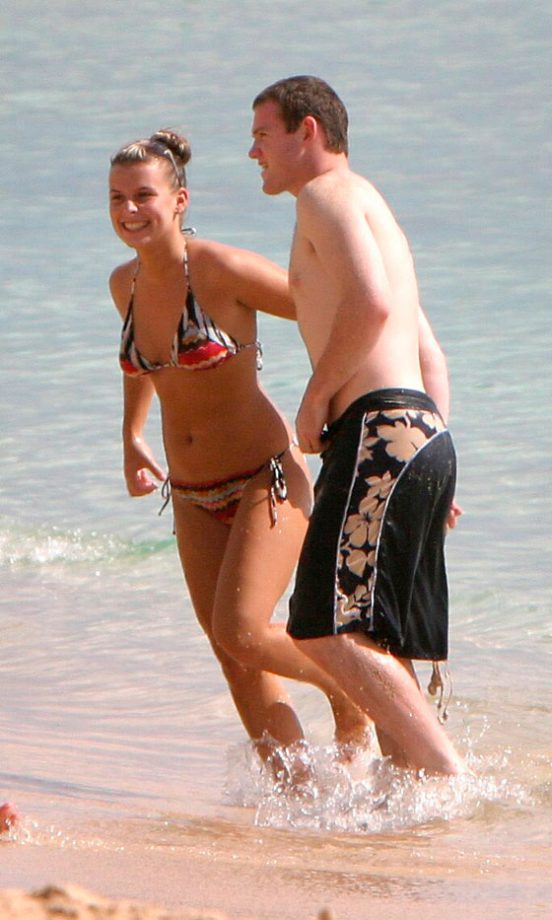 Coleen Rooney Frolics On The Beach With Wayne Rooney In Barbados, July 2004