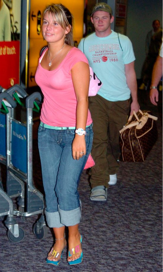 Coleen Rooney Arrives Back In London With A Fresh Tan, July 2004