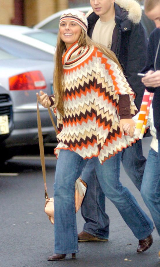 Coleen Rooney Works The Missoni Look In A Printed Poncho And Matching Hat In Manchester, November 2004