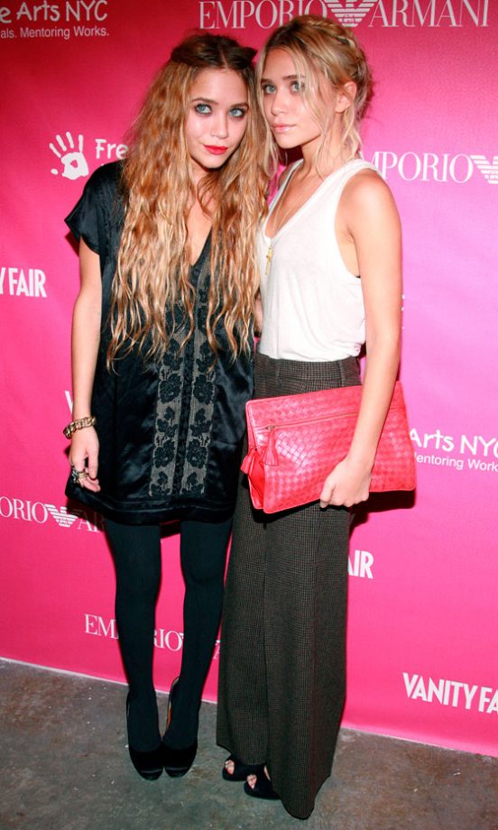 Mary-Kate Olsen Goes For Boho Chic Glamour While Ashley Olsen Opts For A More Sophisticated Look At A New York Art Benefit, May 2006