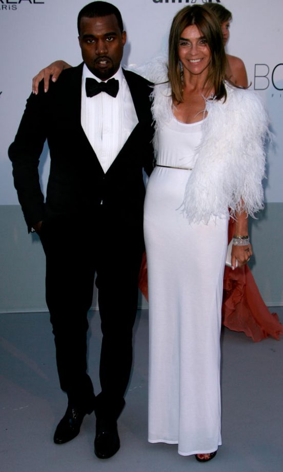 Carine Roitfeld And Kanye West At The AmfAR Gala During Cannes Film Festival 2011