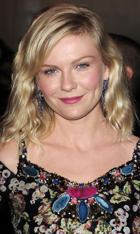 Kirsten Dunst Goes For A Quick Down-Do, 2011