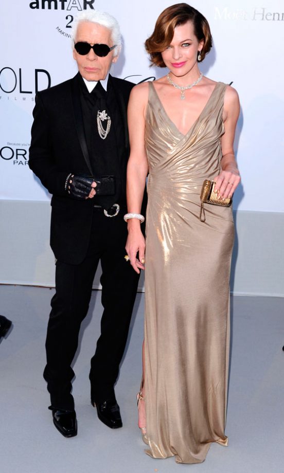 Milla Jovovich With Karl Lagerfeld At The AmfAR Gala During Cannes Film Festival 2011