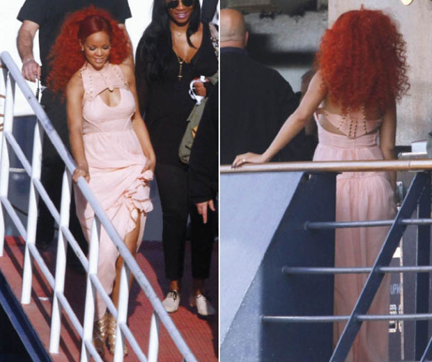 Rihanna shows off a supersized ponytail hairstyle in Germany yesterday