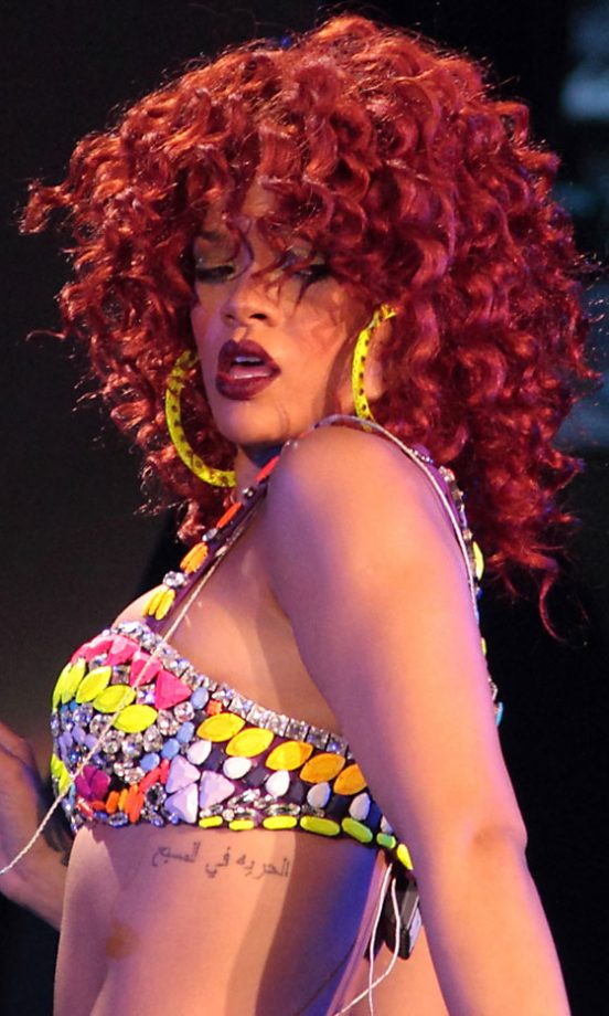 Rihanna Wows On Stage With A Statement Curly Hairstyle, 2011