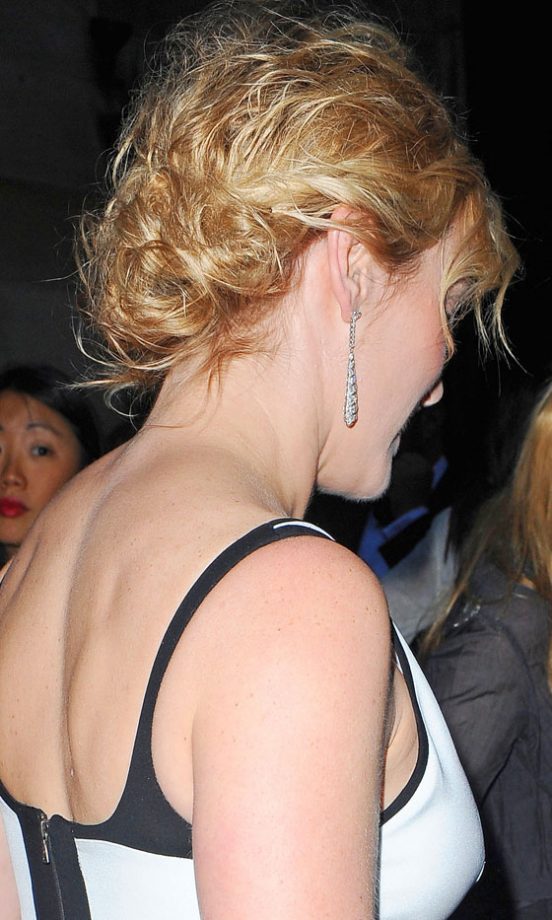 Kate Winslet Teams Her Evening Dress With A Messy Bun Hairstyle, 2011