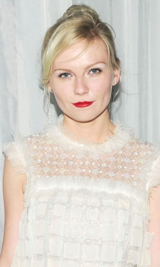 Take Hair Tips From Kirsten Dunst And Team Party Frocks With A Messy Bun Hairstyle, 2011