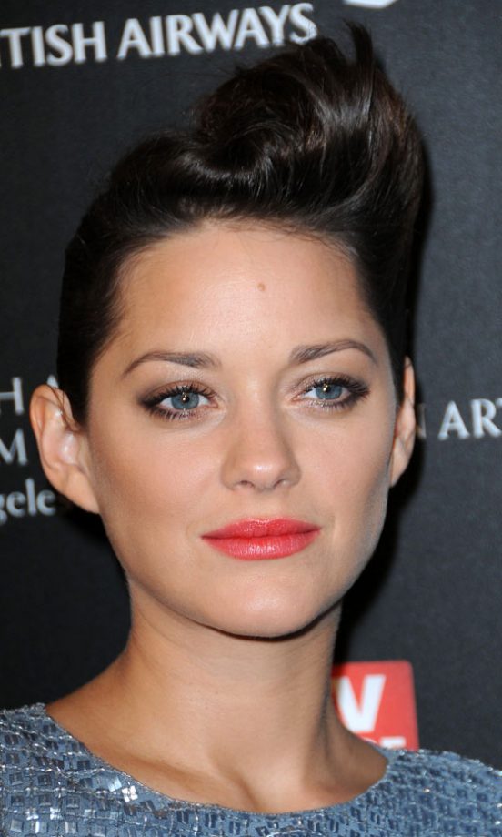 Marion Cotillard Manages To Make Her Retro Updo Hairstyle Look Effortlessly Modern With A Fresh-Faced Make Up Look, 2010