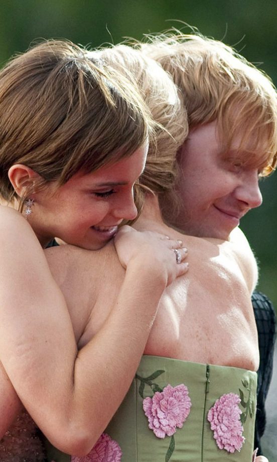 Emma Watson Hugs Rupert Grint And JK Rowling At The Harry Potter And The Deathly Hallows: Part 2 World Film Premiere, 2011