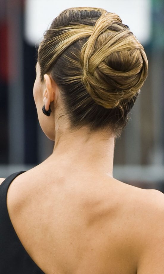 Heidi Klum Manages to Make Dark Roots Look Interesting With A Glam Bun Hairstyle, 2011