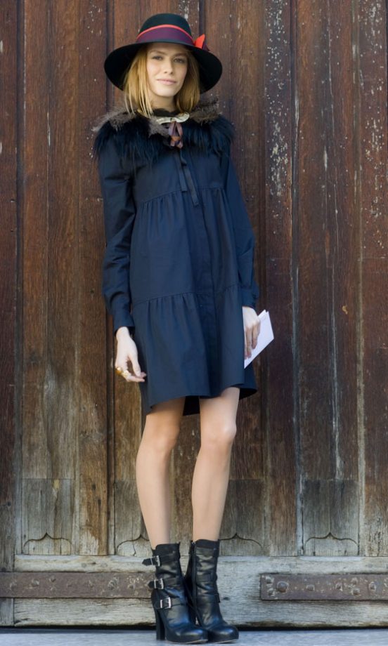 Model Elena Perminova Outside The School of Medicine In A Fabulous Hat And Chic Black Coat