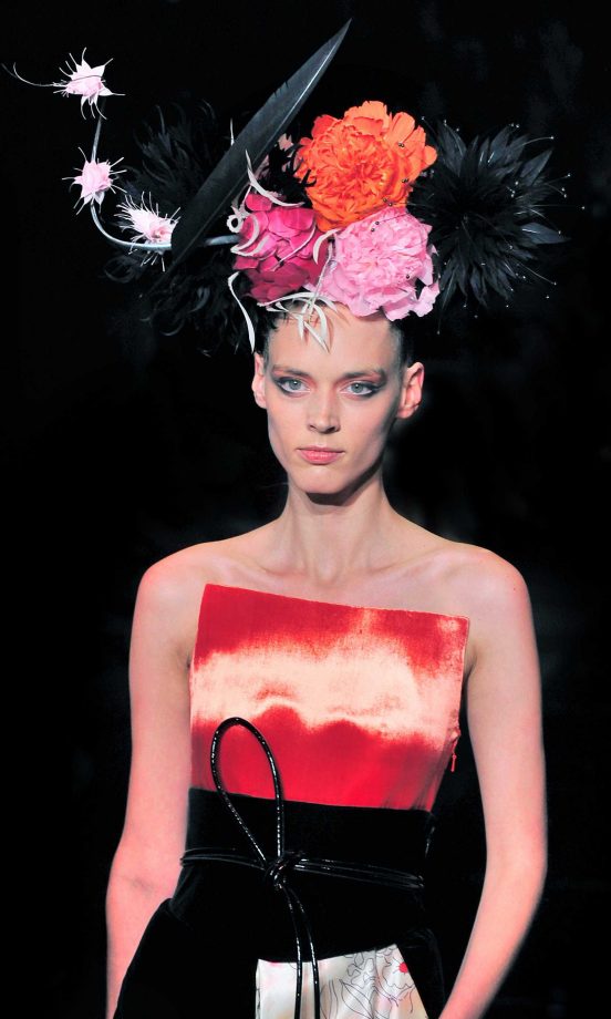 A Model Turns Heads At The Giorgio Armani Prive Haute Couture AW11/12 Fashion Show