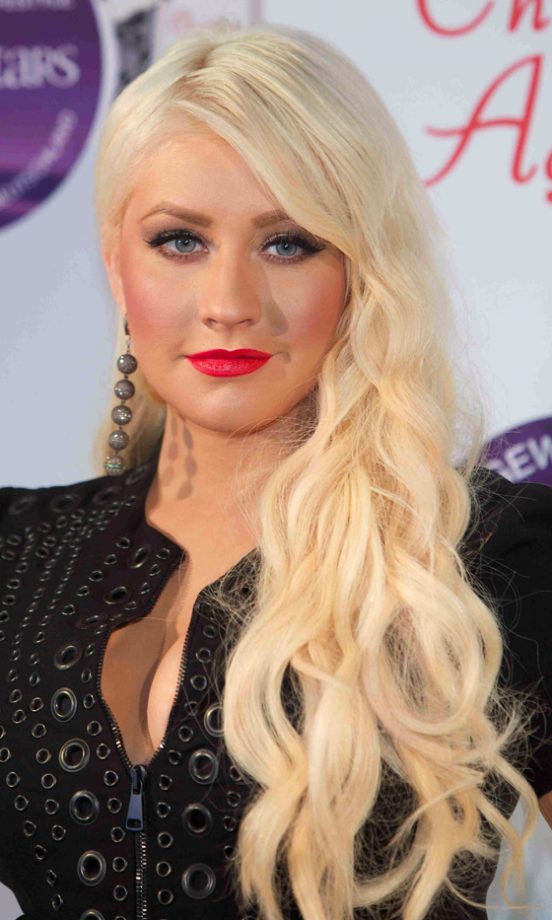 Christina Aguilera Is At Her Most Glamorous With A Side-Swept Blonde Hairstyle, 2011
