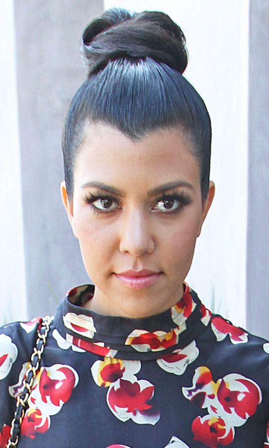 Kourtney Kardashian Goes For An On-Trend Knotted Bun Hairstyle, 2011