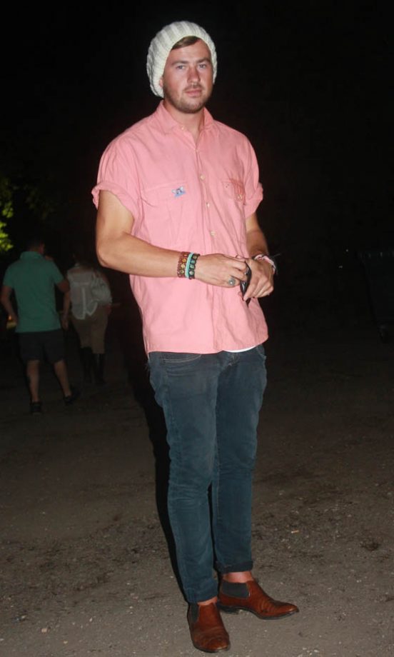 Louis Wears A Shirt From Camden Market And His Shoes And Hat Are From Brick Lane Market At V Festival 2011
