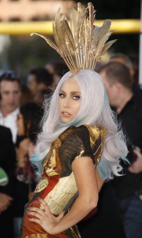 Lady Gaga Wears A Gold Feather Head Piece By Alexander Mcqueen To The 2010 MTV Music Video Awards