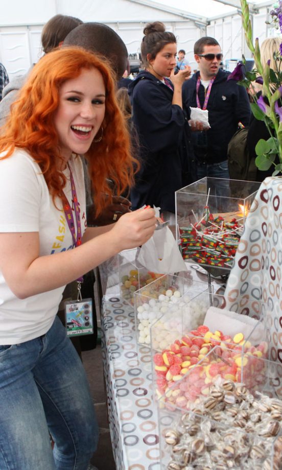 Katy B Finds The Pick And Mix Stall Backstage At V Festival 2011