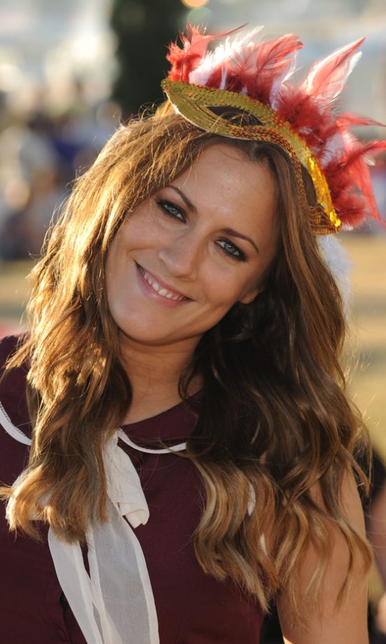 Caroline Flack Adds Feathered Accessories To Her Wavy Hair For A Great Festival Look At V Festival 2011