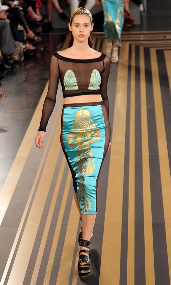 A Model Storming The Catwalk In A Sheer Crop Top At Topshop Unique’s Fashion Show SS12