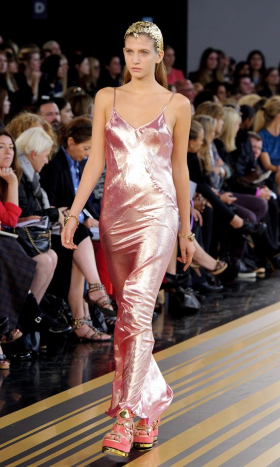 Model Wearing A Stunning Pink Slip Dress On The Catwalk At Topshop Unique’s Fashion Show SS12