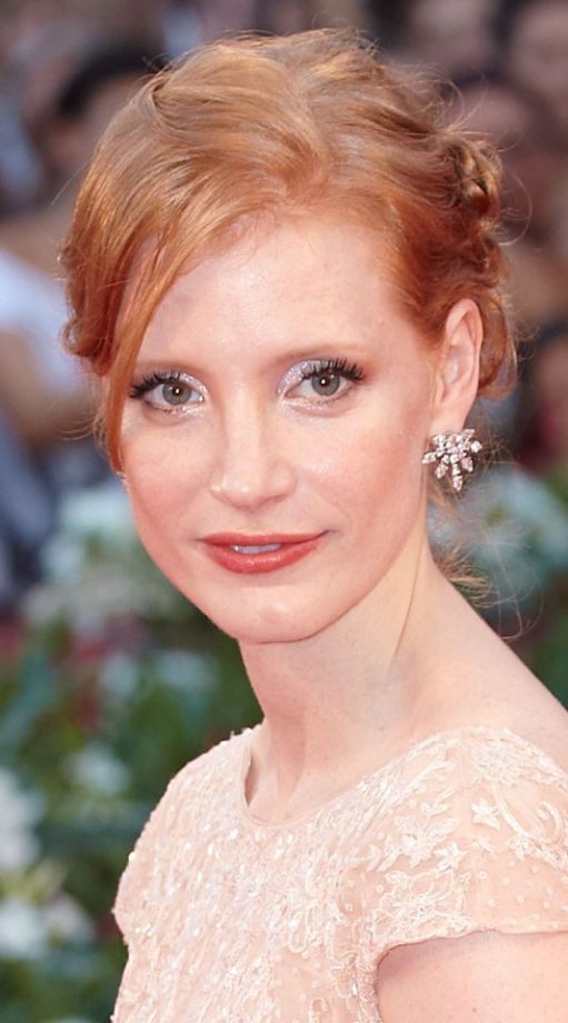 Flame-Haired Jessica Chastain Venice Film Festival With A Twisted Updo Hairstyle, 2011