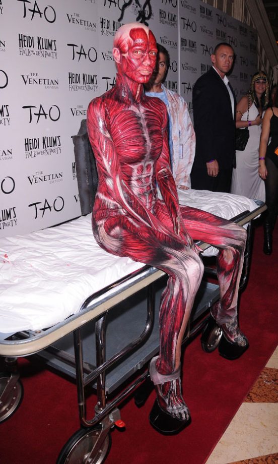 Heidi Klum Arrived At Her Annual Halloween Party On An Autopsy Table, 2011