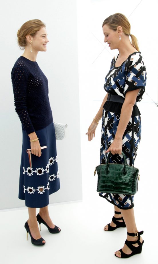 Natalia Vodianova And Uma Thurman Compare Outfits At The Louis Vuitton SS12 Show At Paris Fashion Week, 2011