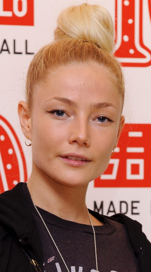Clara Paget Scrapes her Hair Back In A Top Knot Bun 2011