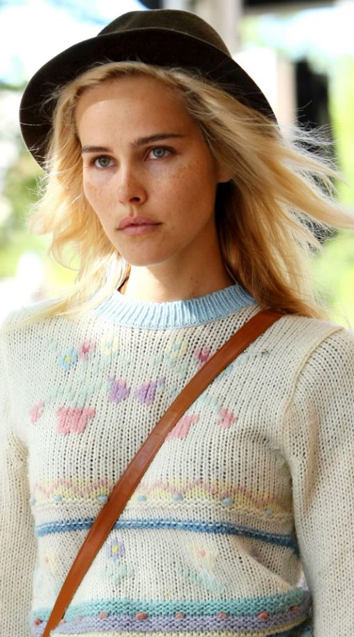 Isabel Lucas Lets Her Hair Flow Out From Her 70's Style Hat, 2011