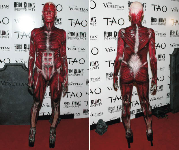 Heidi Klum dressed as a dead body with skin missing for Halloween