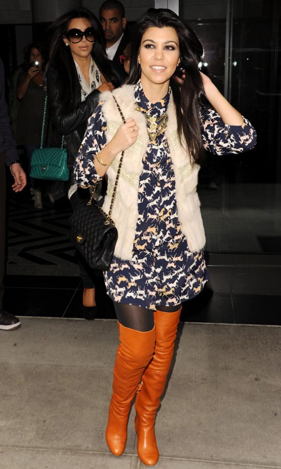 Kourtney Kardashina Works Her Summer Dresses Into Her AW11 Wardrobe By Accessorizing With Winter Boots And Gilet, 2011