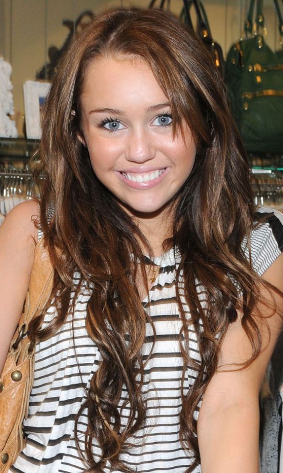 Miley Cyrus Suits Her Naturally Brown Hair With Copper Highlights