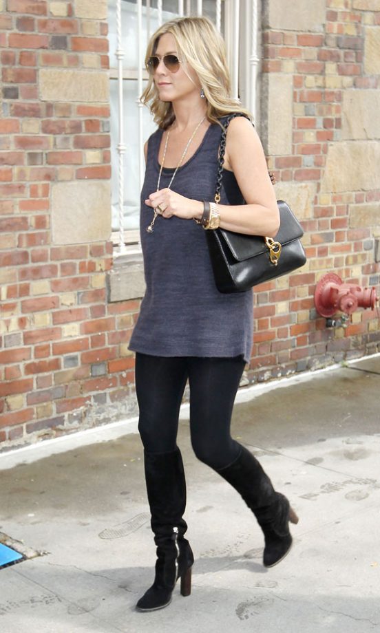 Jennifer Aniston Goes For Fuss Free Glam With Black Boots And A Longline Vest, 2011
