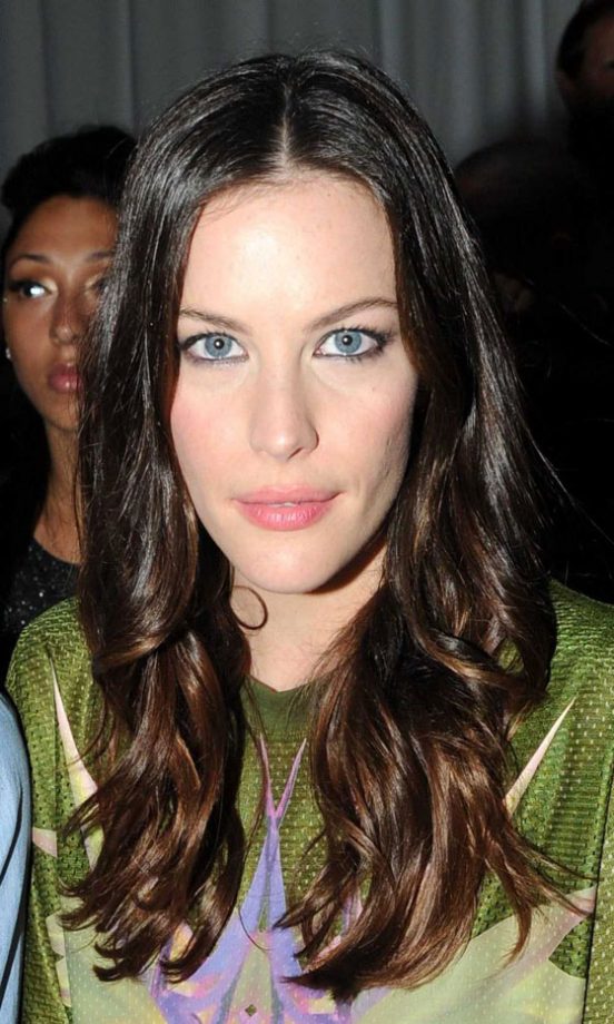 Liv Tyler's Messy Waves And Centre Parted Hairstyle Looks Front Row Perfect At Givenchy's SS12 Fashion Show, 2011