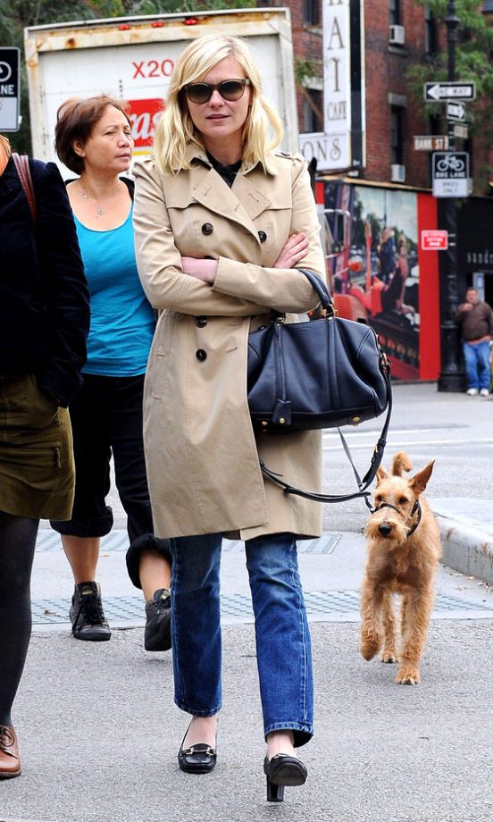 Kirsten Dunst Covers Up With The Ultimate Winter Warmer - A Tailored Trench Coat, 2011