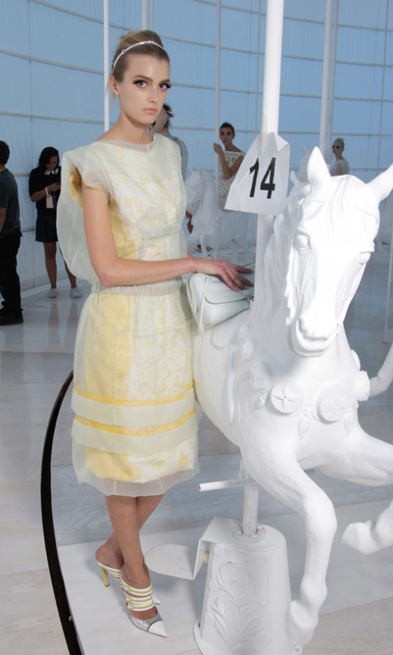 A Model Prepares At The Louis Vuitton SS12 Show At Paris Fashion Week, 2011
