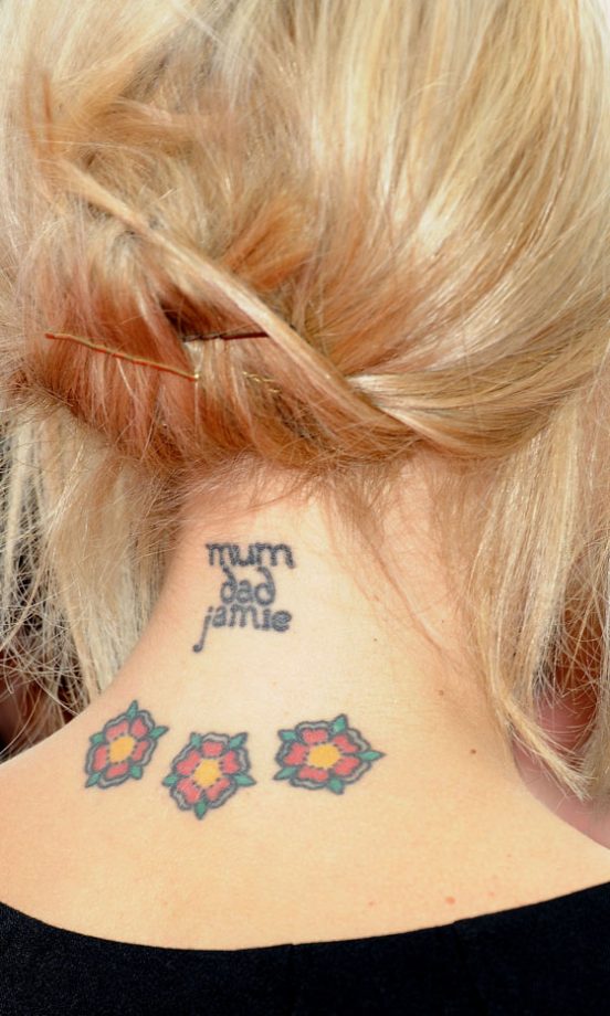Pixie Lott Shows Off Her Tattoos With A Cute Up-Do Hairstyle, October 2011