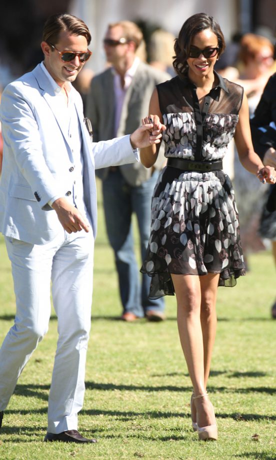 Zoe Saldana Gets A Helping Hand At The Veuve Clicquot Polo Classic 2011