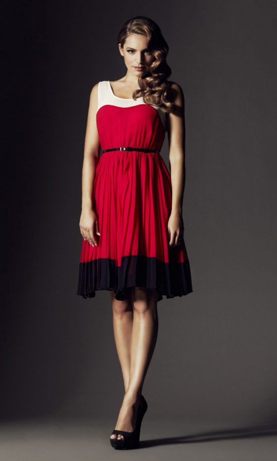 Kelly Brook Wearing A Red And Black Dress, £39.99 From New Look’s Christmas Party Dress Collection 2011