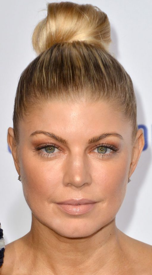 Fergie Puts Her Hair Up In A Severe Scraped Back Bun, 2011