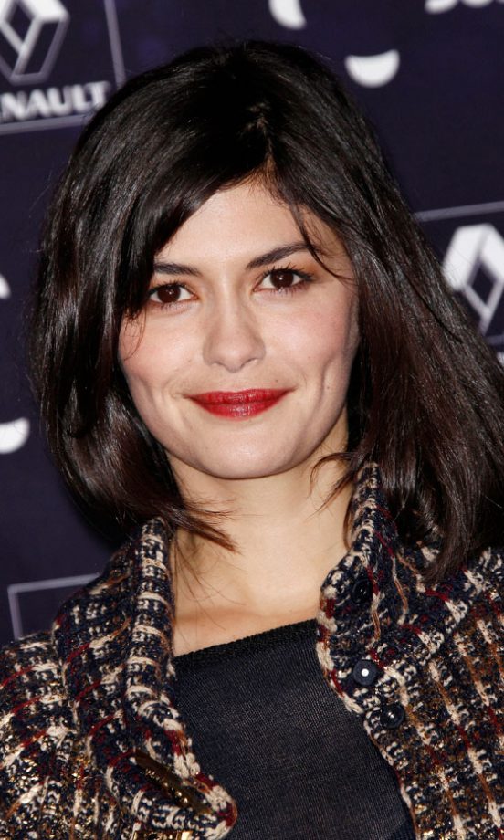 Audrey Tautou's Signature Red Lipstick Look Completed Her Sophisticated Ensemble While Turning On The Christmas Lights On The Champs-Elysees. 2011