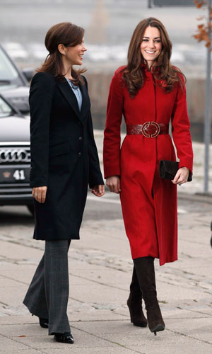Kate Middleton wearing a red L.K Bennett coat with Princess Mary of Denmark