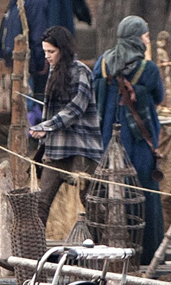 In Between Scenes Kristen Stewart Worked A Check Shirt And Jeans
