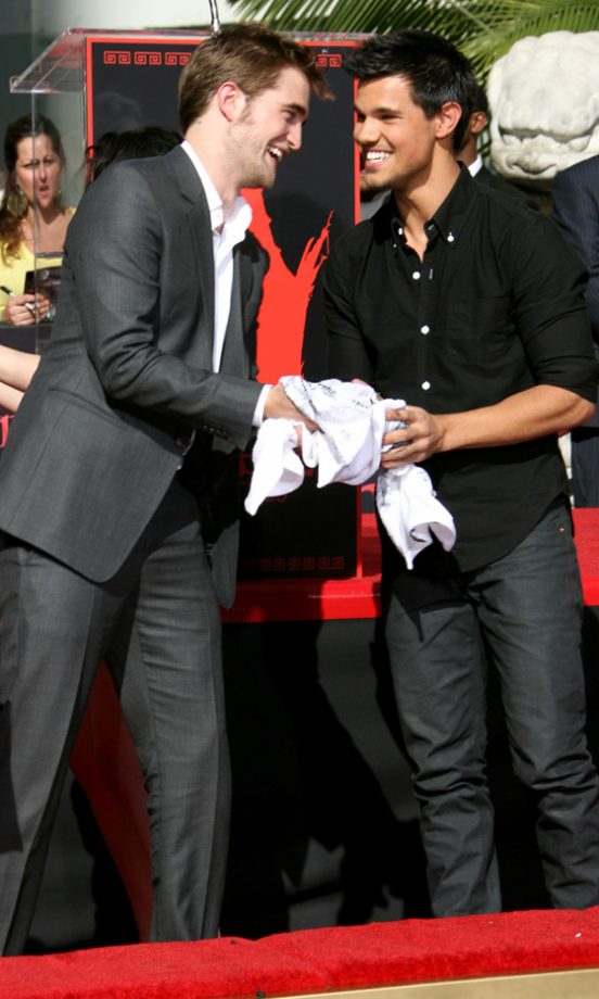 Robert Pattinson And Taylor Lautner At The Twilight Hand And Foot Print Ceremony, 2011