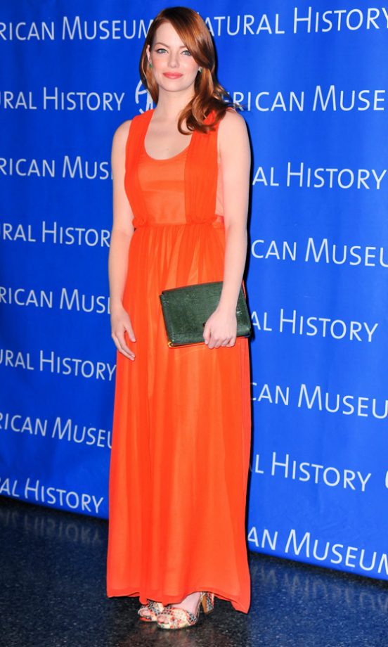 Emma Stone Teamed Her Tangerine Dress With A Green Clutch Bag And Gold Sandals - We're Loving This Fashion Combo