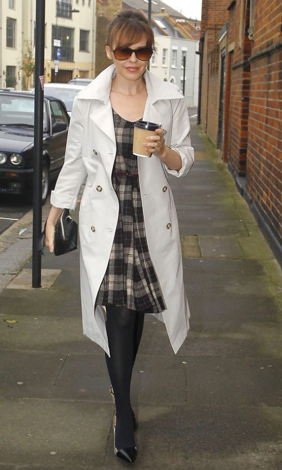 Kylie Minogue Worked A Classic Trench Coat And Super-Cute Check Dress On A Coffee Run In London, 2011