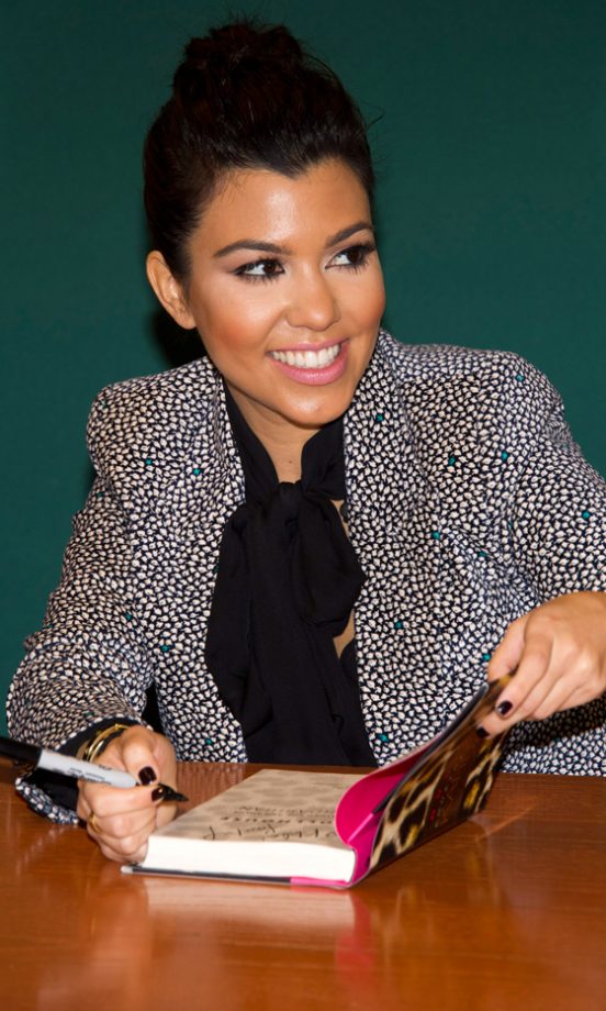 Kourtney Kardashian Kept Her Hair Simple In A Classic Bun Hairstyle At The Dollhouse Book Signing, 2011