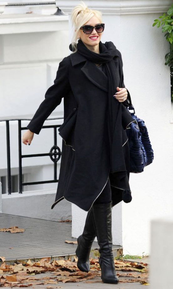 Gwen Stefani Worked This Season's Hottest Cover Up - The Cape - While Leaving Her London Home. 2011